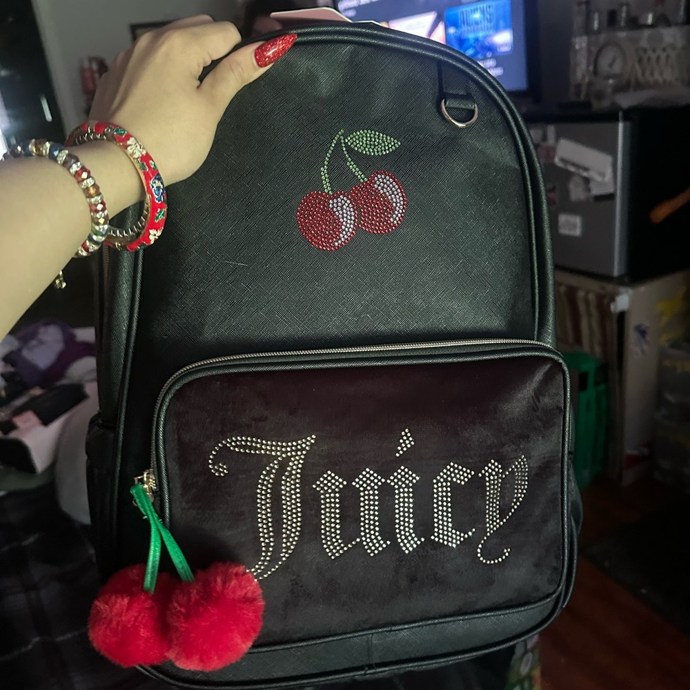 Juicy Couture Black and Red Backpack with Sleek Design